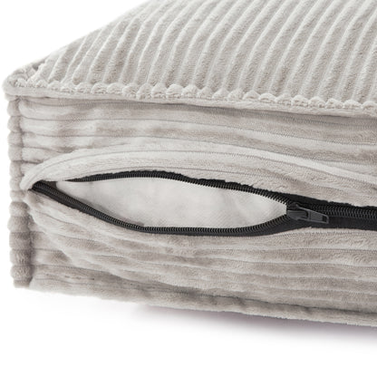 Dax Medium Corduroy Dog Bed – Grey Soft Support features a close-up of plush corduroy fabric, hidden zipper, and bolstered edges, showcasing durable stitching and fiber filling for enhanced pet comfort.