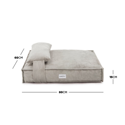Dax Medium Corduroy Dog Bed – Grey Soft Support features a plush, bolstered design with a corduroy texture, providing comfort and style, ideal for small to medium pets.
