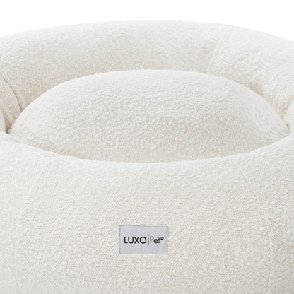 Kyra Large Boucle Pet Bed – Light Beige Plush Comfort, featuring a close-up of plush raised bolsters in soft boucle fabric, designed for ergonomic support and modern style.