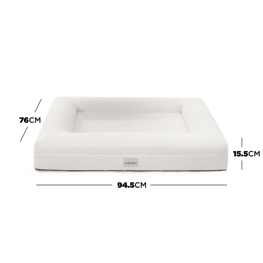 Tyro Luxe Medium Orthopedic Pet Bed – Light Beige; close-up of a plush, textured surface with a subtle logo, highlighting its supportive structure and premium fabric designed for pet comfort.