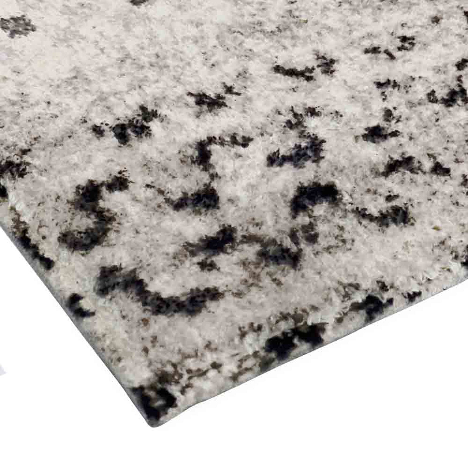 Close-up of the Alyne 200x300 Indoor Contemporary Large Floor Rug, showcasing its modern tribal-inspired design with soft texture and dark line prints on a neutral cream background, ideal for hard floors.