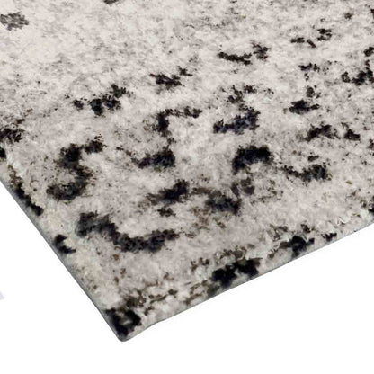 Close-up of the Alyne 200x300 Indoor Contemporary Large Floor Rug, showcasing its modern tribal-inspired design with soft texture and dark line prints on a neutral cream background, ideal for hard floors.