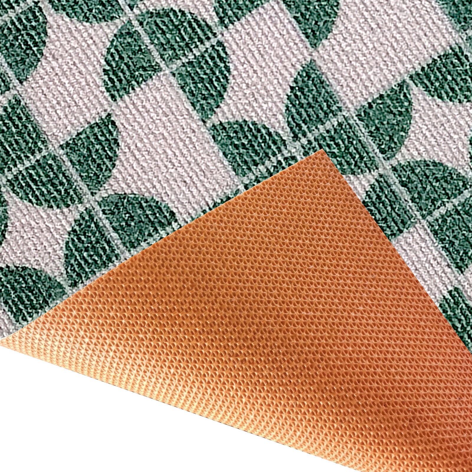 Close-up of Angell 60x90cm Modern Outdoor Floor Doormat in Teal showing a white surface with green leaf-like pattern and a warm-orange non-slip, textured rubber backing flipped at the corner.