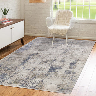 Ari 160x230cm Medium Tufted Printed Indoor Floor Rug features a modern abstract design on a minimalist wood floor, enhancing the sitting area with its textured, plush presence beneath a white wire-frame chair.