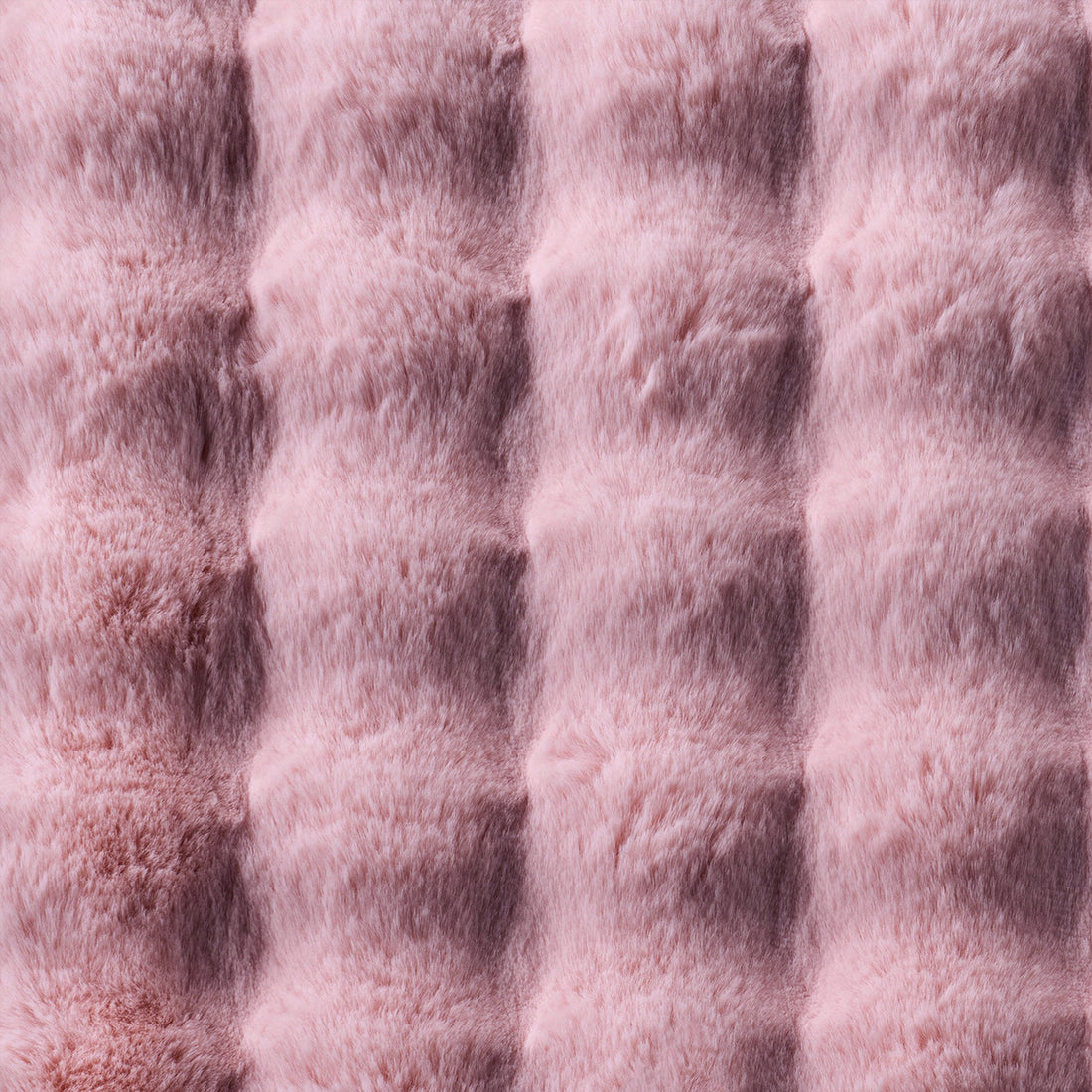 Armida 160cm Round Fluffy Faux Fur Bubble Rug in Dusty Pink, featuring a plush, tufted pattern of raised rectangular pillows, offering a cosy, luxurious, and textured appearance.