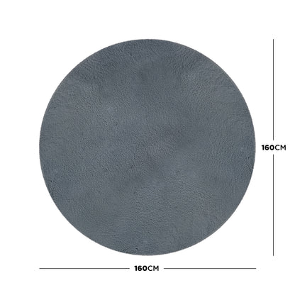 Azaliya Dark Grey Round Faux Rabbit Fur Rug 160cm, showcasing a simple, plush design in solid charcoal grey, laid flat with visible ruler markings indicating its 160 cm diameter, emphasizing its minimalist elegance.