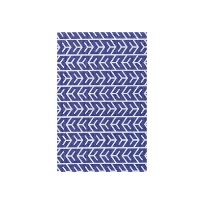 Carey 45x75cm Outdoor Doormat in White & Indigo features a repeating white chevron pattern on a blue background, showcasing an abstract design perfect for enhancing modern indoor or outdoor spaces.
