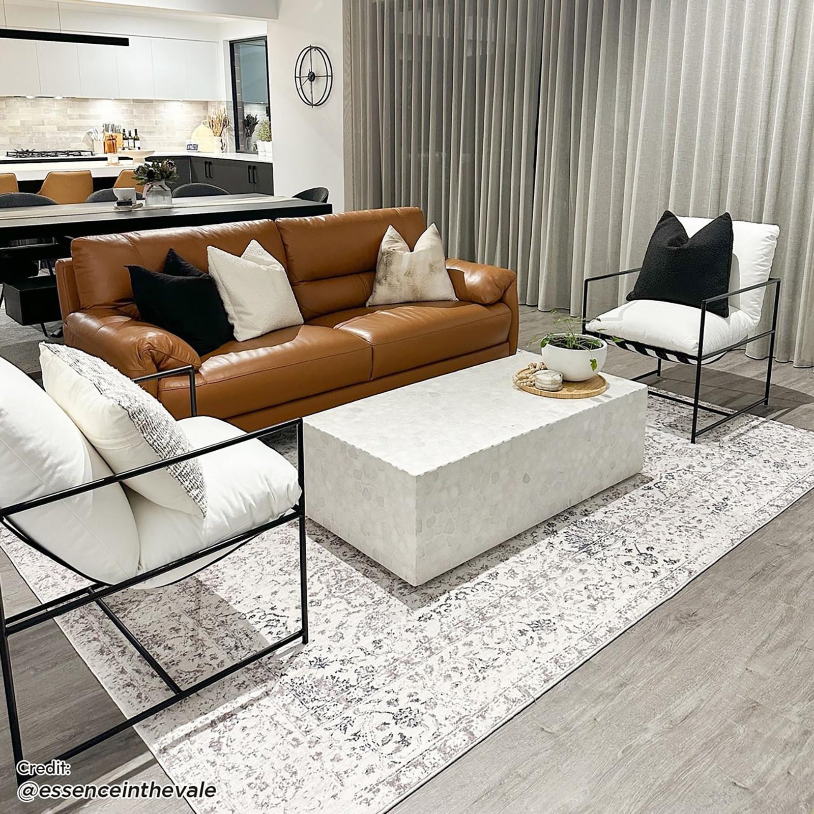 Cesco 200x300cm Polyester Persian Printed Indoor Floor Rug lies on grey-tone wood flooring, showcasing a plush Persian pattern, adding texture and sophistication to the modern, open-plan living area.