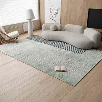 Elimas Soft Contemporary Printed Rug 120x180cm displayed on a carpet showcases its modern design and soft texture, complemented by a nearby book and lamp, enhancing any interior setting.