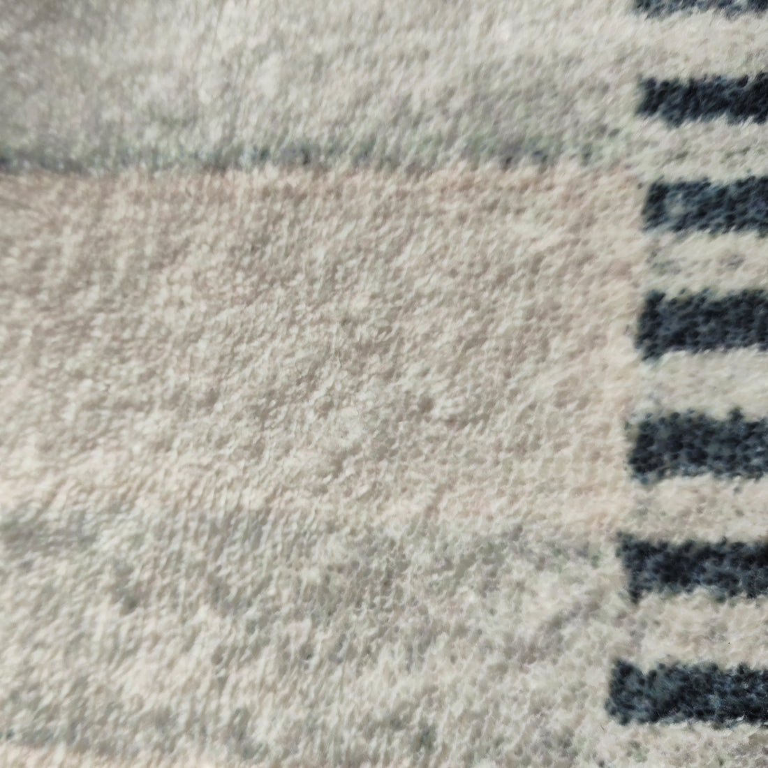 Elimas Soft Contemporary Printed Rug 160x230cm showcases a close-up of its textured surface, highlighting the soft 12mm pile and intricate modern pattern, designed for comfort and style in any room.