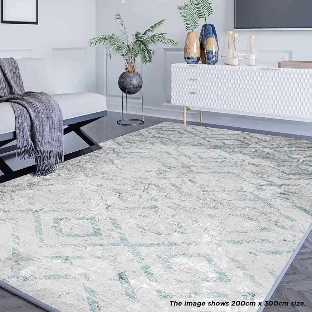 Foldvik Art Contemporary Rug 120x170cm displayed on a hardwood floor, showcasing its tribal-inspired pattern. The rug's flat, smooth texture is highlighted, emphasizing the anti-slip backing for stability and safety.