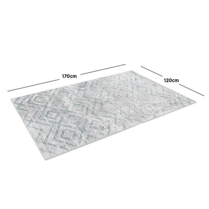 Foldvik Art Contemporary Rug 120x170cm features a smooth, flat design with intricate, tribal-inspired patterns, ideal for various decors. The rug's anti-slip backing ensures stability on hard surfaces.