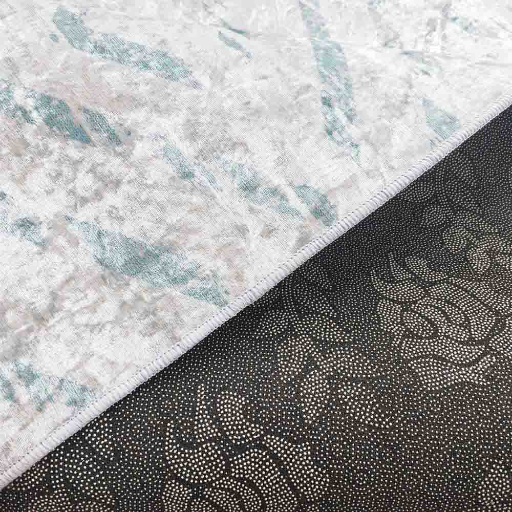 Foldvik Art Contemporary Rug 160x230cm showcases a tribal-inspired pattern with intricate motifs, ideal for various decors. This soft, durable rug features an anti-slip backing, perfect for hardwood floors.