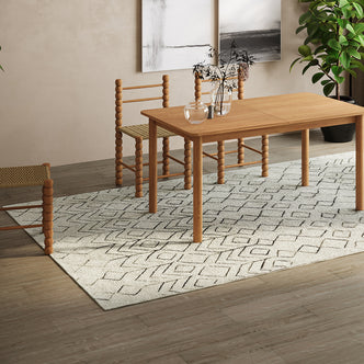 Hepirus Soft Contemporary Printed Rug 120x180cm on a floor, showcasing a plush texture and modern design, complemented by a nearby table and chairs, enhancing a room's warmth and style.