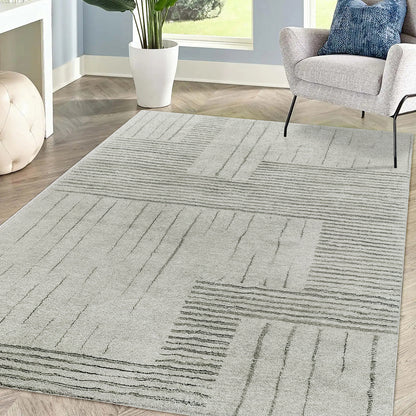 Jabeza Soft Contemporary Printed Rug 120x180cm displayed on a wooden floor, emphasizing its soft 12mm pile and modern design, ideal for adding warmth and comfort to home interiors.