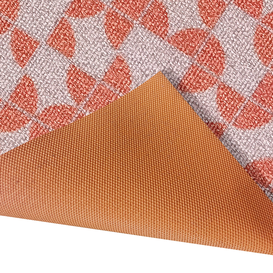 Close-up of Macy 45x75cm Modern Outdoor Doormat in Light Terracotta, featuring an off-white loop-pile with orange geometric pattern and a solid orange, non-slip rubber backing.