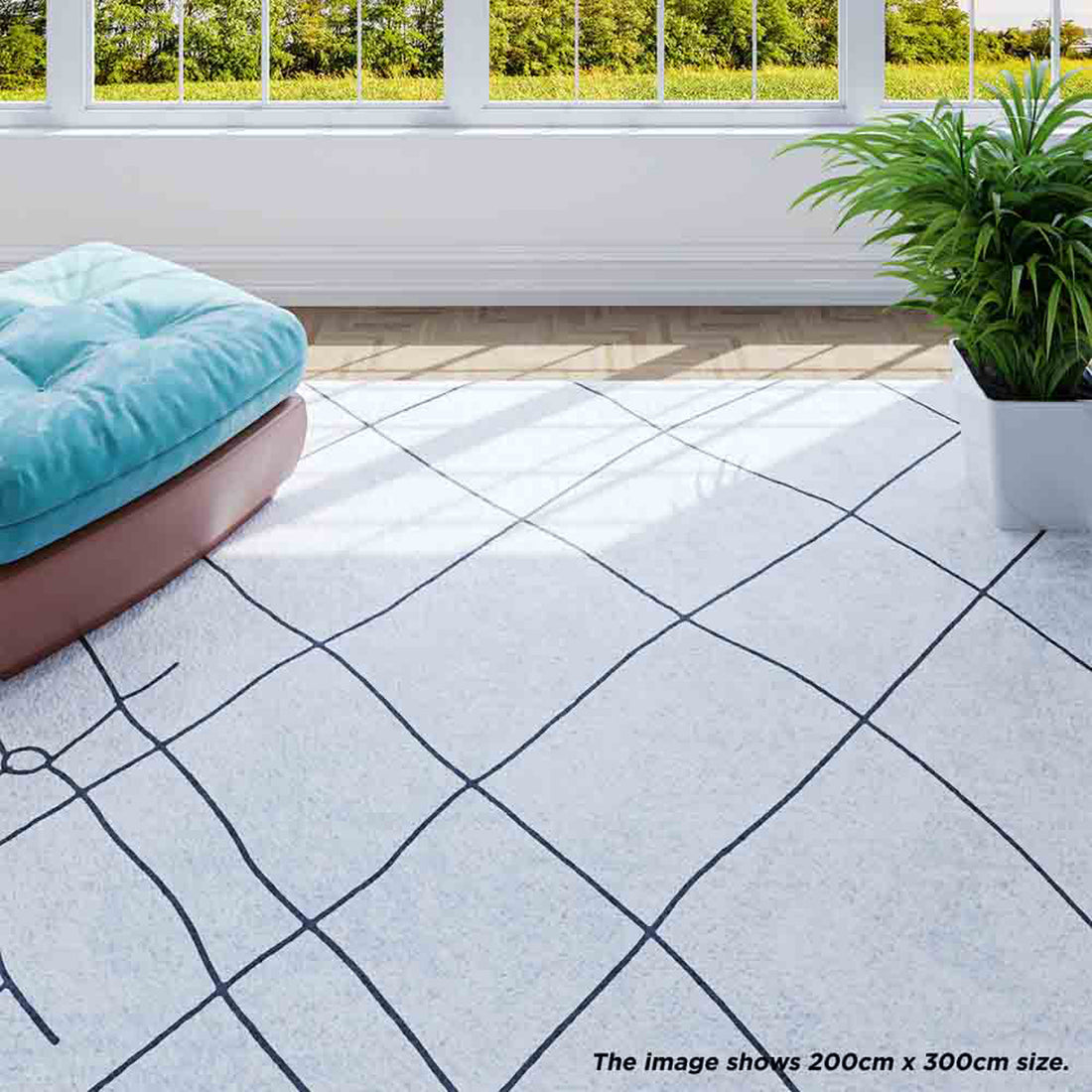 Melody Black & White Modern Rug 120x170cm features striking black abstract lines on an ivory backdrop, ideal for complementing bold furniture in living or dining rooms.