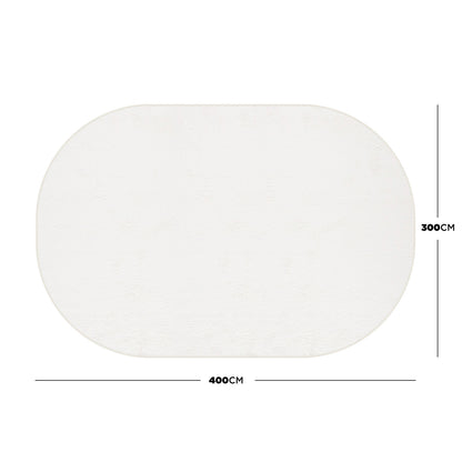 Pavla 300 x 400cm Oval Shaggy Rug in Cream White, featuring smooth, curvy edges, visible dimensions, and a plush, textured surface, laid out on a plain background.