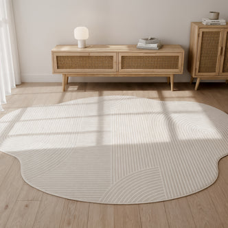 The Penina 300 x 400cm Cloud Soft Rug in Neutral, with its pale cream hue and subtle concentric stripes, complements the mid-century console and airy, light-filled space beautifully.