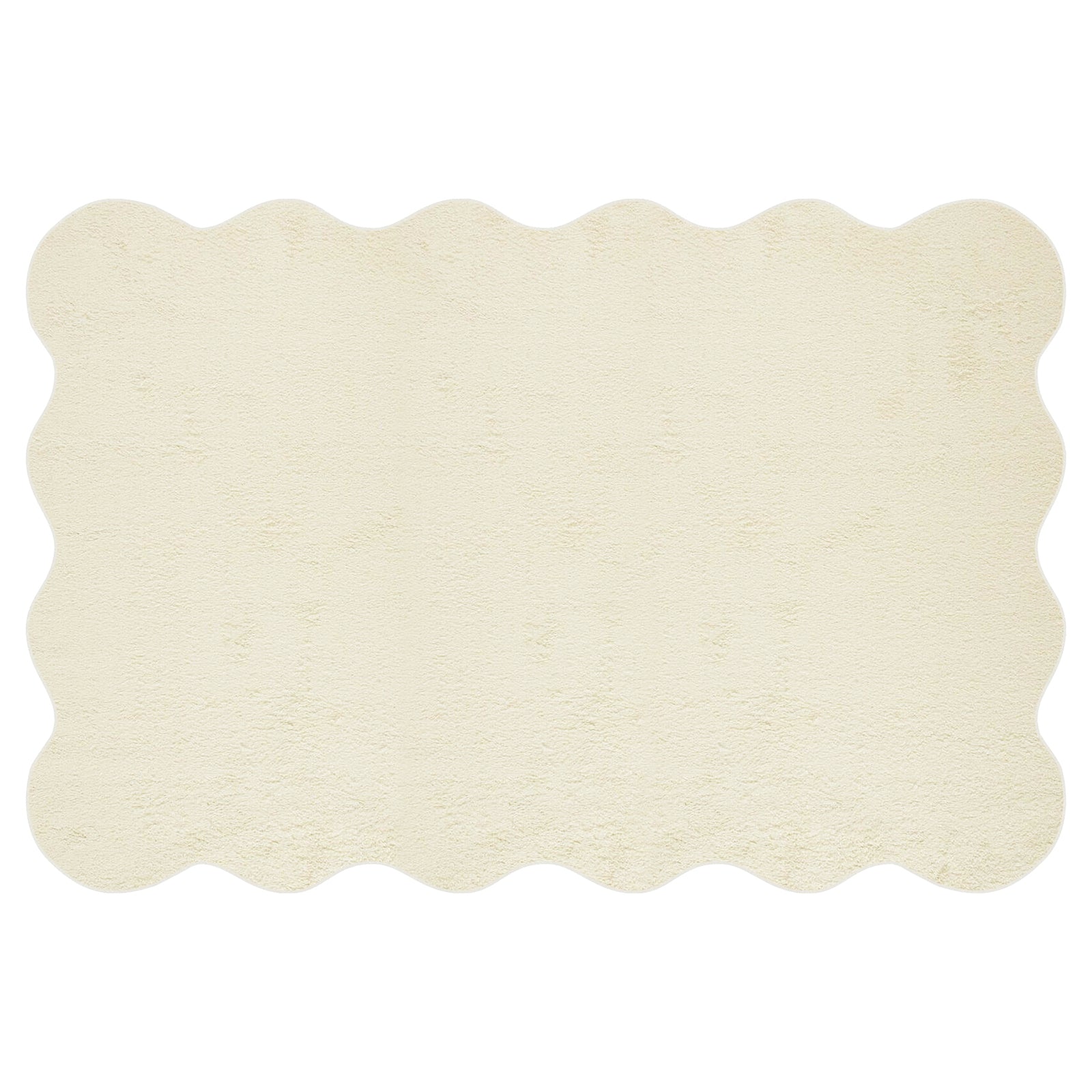 Pixie 240x330cm Wavy Large Shag Rug in Beige features a plush, scalloped-edged design with a towel-like texture, offering a stylish and cozy addition to any living space.
