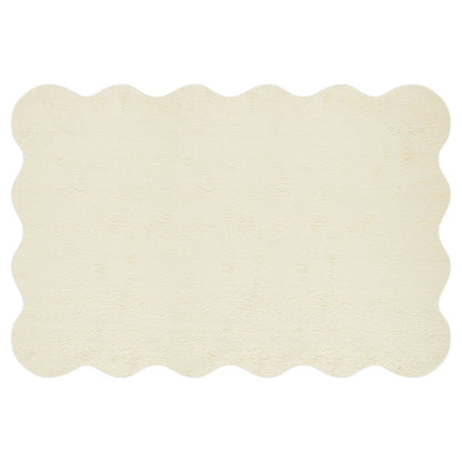 Pixie 240x330cm Wavy Large Shag Rug in Beige features a plush, scalloped-edged design with a towel-like texture, offering a stylish and cozy addition to any living space.
