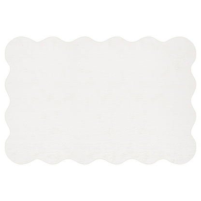 Pixie 300x400cm Large Wavy Shag Rug in Cream White features a gently scalloped edge and a lightly textured surface, enhancing its elegant design and luxurious feel.