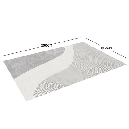 Ramvik 160x230cm Abstract Indoor Floor Rug features a simple, abstract curved-line design, highlighting its artistic flair and modern functionality.