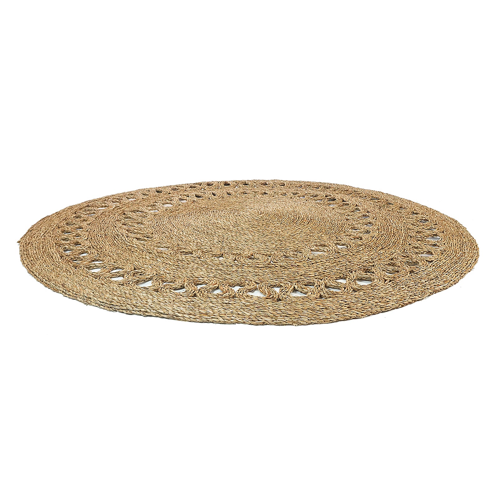 Sandra Brown Seagrass Rug 180cm features a large, round woven design with concentric braided natural fibers, ideal for adding warmth and texture to minimalist or modern interiors.