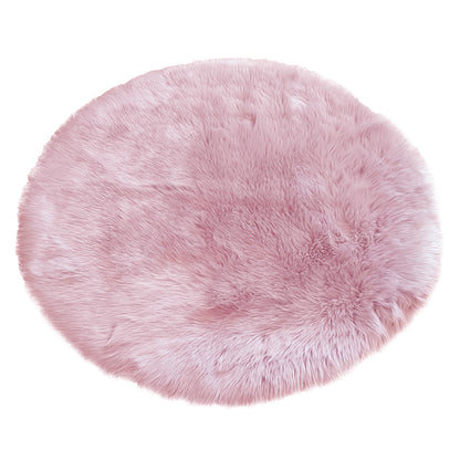 Shaddi 120cm Round Shaggy Soft Fluffy Fur Rug in Pink, featuring a soft pink faux-fur texture with a plush, shaggy appearance, ideal for adding warmth and luxury to any room.