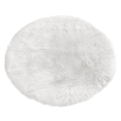 Shaddi 120cm Round Shaggy Soft Fluffy Fur Rug in White, featuring a plush, faux-fur texture with a suede backing. Ideal for adding cosy elegance to any room.
