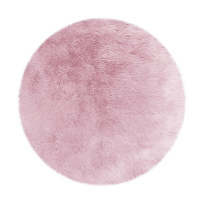 Shaddi 160cm Round Shaggy Soft Fluffy Fur Rug in Pink, featuring a plush, faux fur texture, ideal for adding warmth and luxury to any room.