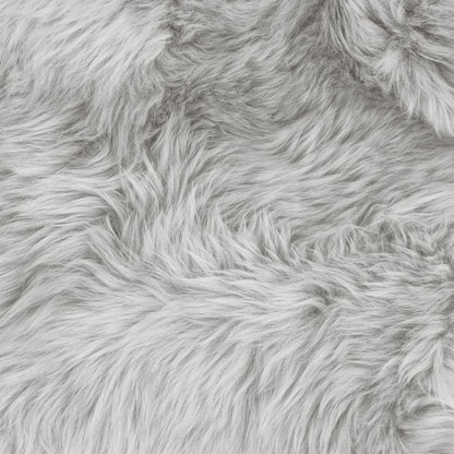 Close-up of the Silvanus 60x90cm Shaggy Soft Fluffy Fur Rug in Grey, showcasing its plush, shaggy faux-fur texture with wispy fibers, ideal for a cosy and stylish decor touch.