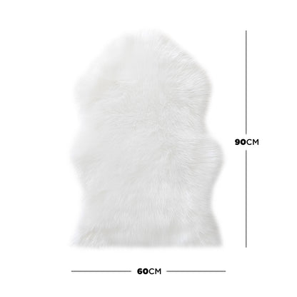 Silvanus 60x90cm Shaggy Soft Fluffy Fur Rug in White, displayed flat, showcasing its plush, sheepskin-style texture and approximately 60 cm by 90 cm dimensions, ideal for adding cosiness to any room.