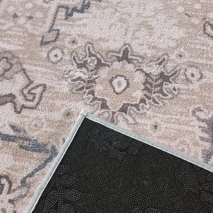 Trolvik 160x230cm Medium Persian Indoor Floor Rug with a beige/gray floral-geometric pattern, showcasing a corner flipped to reveal its black, dot-patterned non-slip backing, highlighting craftsmanship and modern elegance.