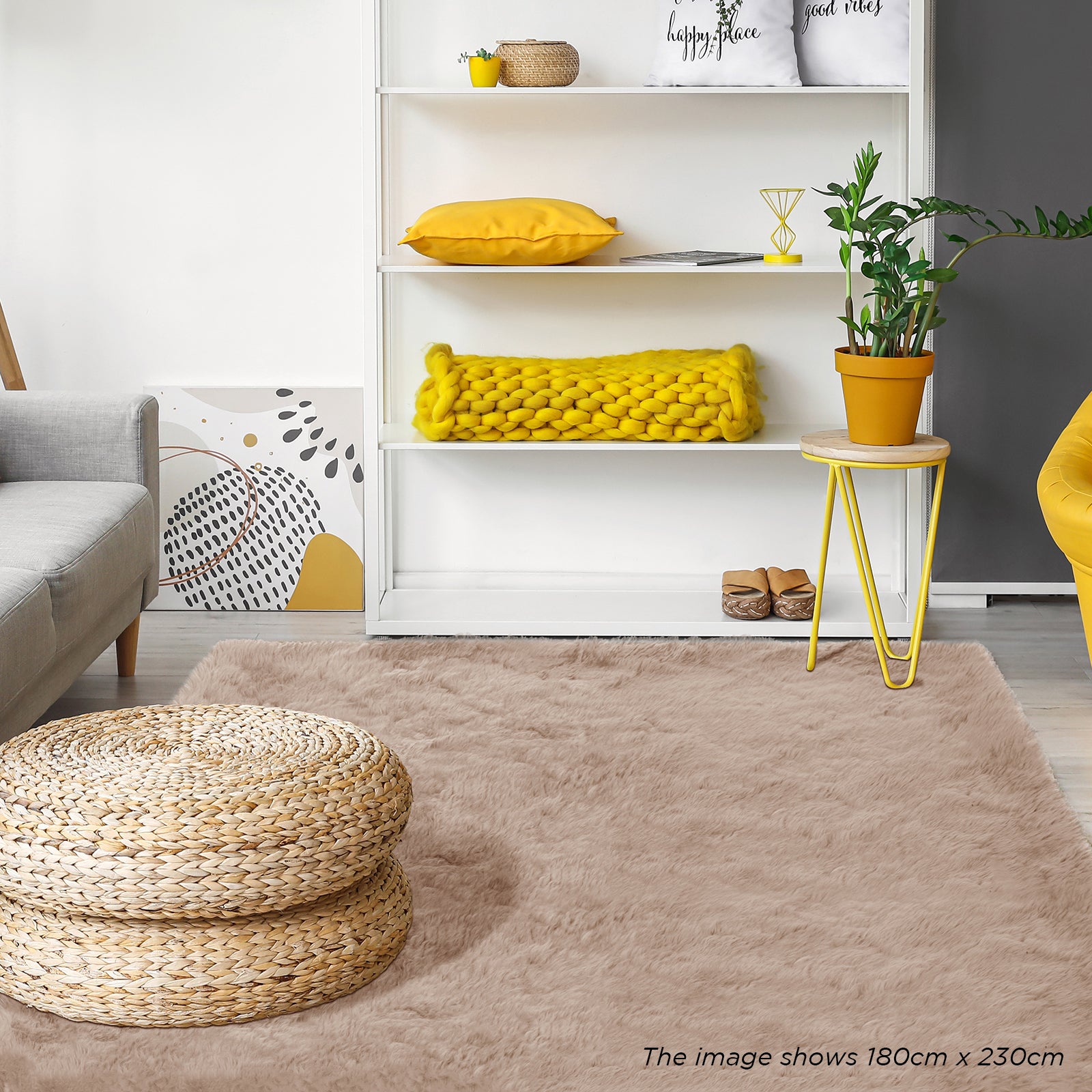 Zubuin 180x230cm Shaggy Plush Rectangular Rug in Beige, showcased in a cozy living room with a woven pouf, yellow accents, and modern furniture, enhancing warmth and style.