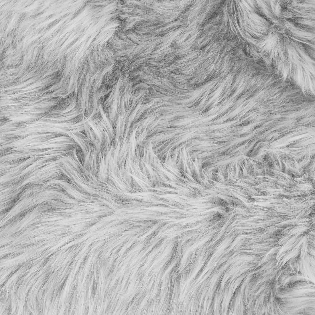 Zubuin 120x180cm Shaggy Plush Rectangular Rug in Grey, showcasing a close-up of its soft, shaggy faux-fur texture, resembling plush sheepskin, ideal for adding warmth and comfort to any room.