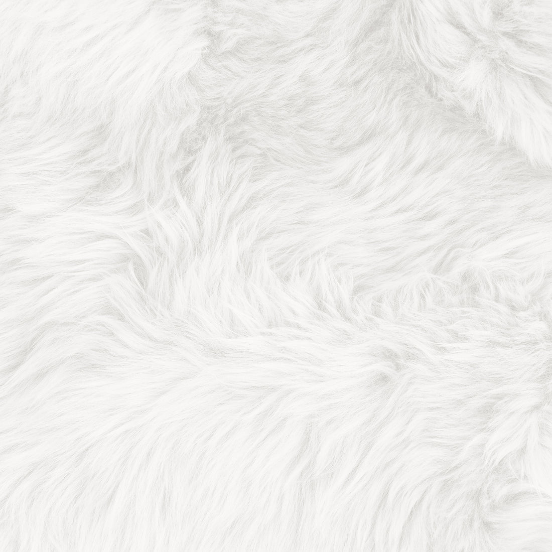 Close-up of the Zubuin Shaggy Plush Fluffy Rectangular Fur Rug - White 90 x 150cm, showcasing its soft, shaggy faux fur texture that mimics lambskin, filling the entire frame.