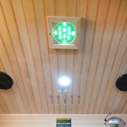 Close-up of the Hirsi 2 Person Carbon Fibre Infrared Sauna – Hemlock, showcasing the built-in Bluetooth speaker, digital touch control panel, and hypoallergenic Canadian Hemlock wood interior.
