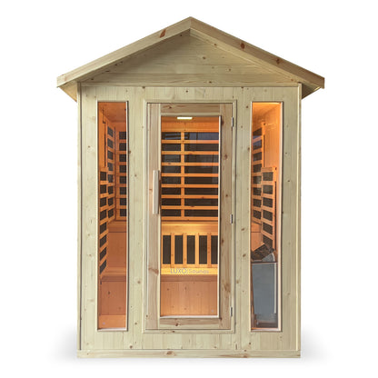 Kiima 3 Person Hybrid Finnish Outdoor Sauna in Natural, showcasing a wooden infrared sauna cabin with a glass door, narrow windows, interior bench seating, and slatted wood concealing infrared heaters.