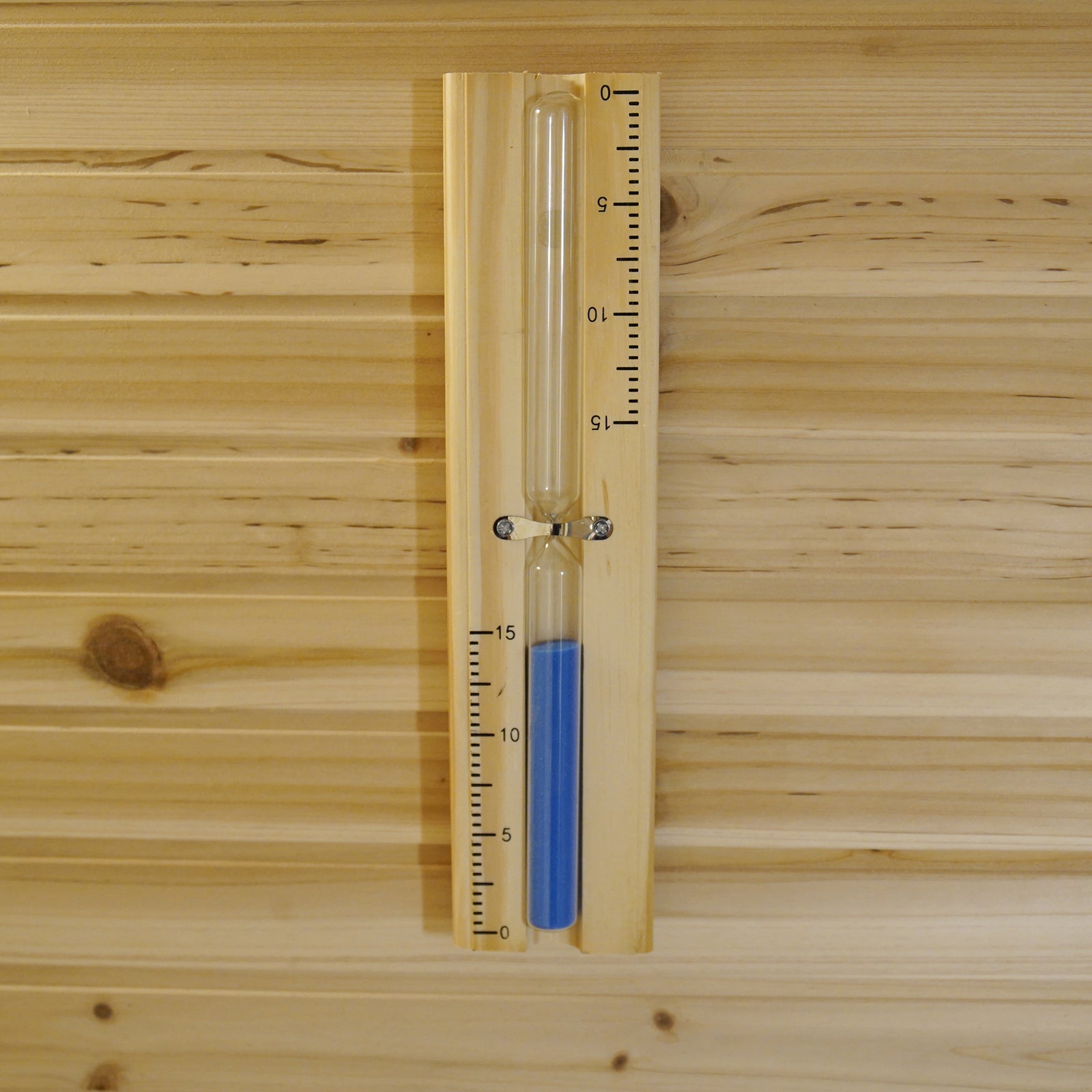 Kivi 4-Person Traditional Outdoor Finnish Home Sauna featuring a wooden wall-mounted 15-minute hourglass with blue sand, enhancing the sauna experience by tracking relaxation time.