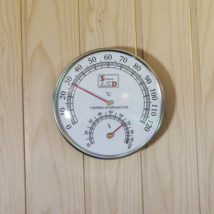 Loyly 3 Person Traditional Finnish Indoor Home Sauna features a chrome-edged white thermo-hygrometer on a light wooden panel, displaying temperature and humidity, enhancing the sauna experience with precise climate monitoring.
