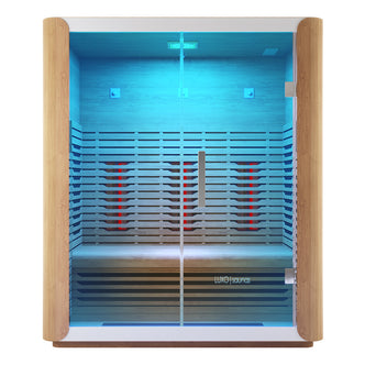 Lue 3 Person Canadian Hemlock Far Infrared Home Sauna with light-wood framing, glass front, glowing infrared panels, blue accent lighting, and comfortable bench. Features stainless steel handle and Luxo Saunas logo.