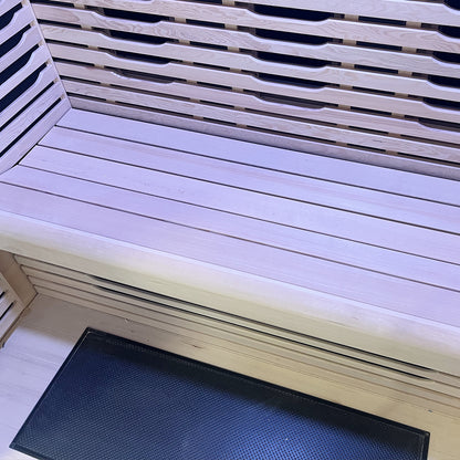Lue 3 Person Full Spectrum Curved Infrared Indoor Home Sauna features a corner seating area with light wood slats and a black rubber mat, showcasing its spacious and modern design for relaxation.