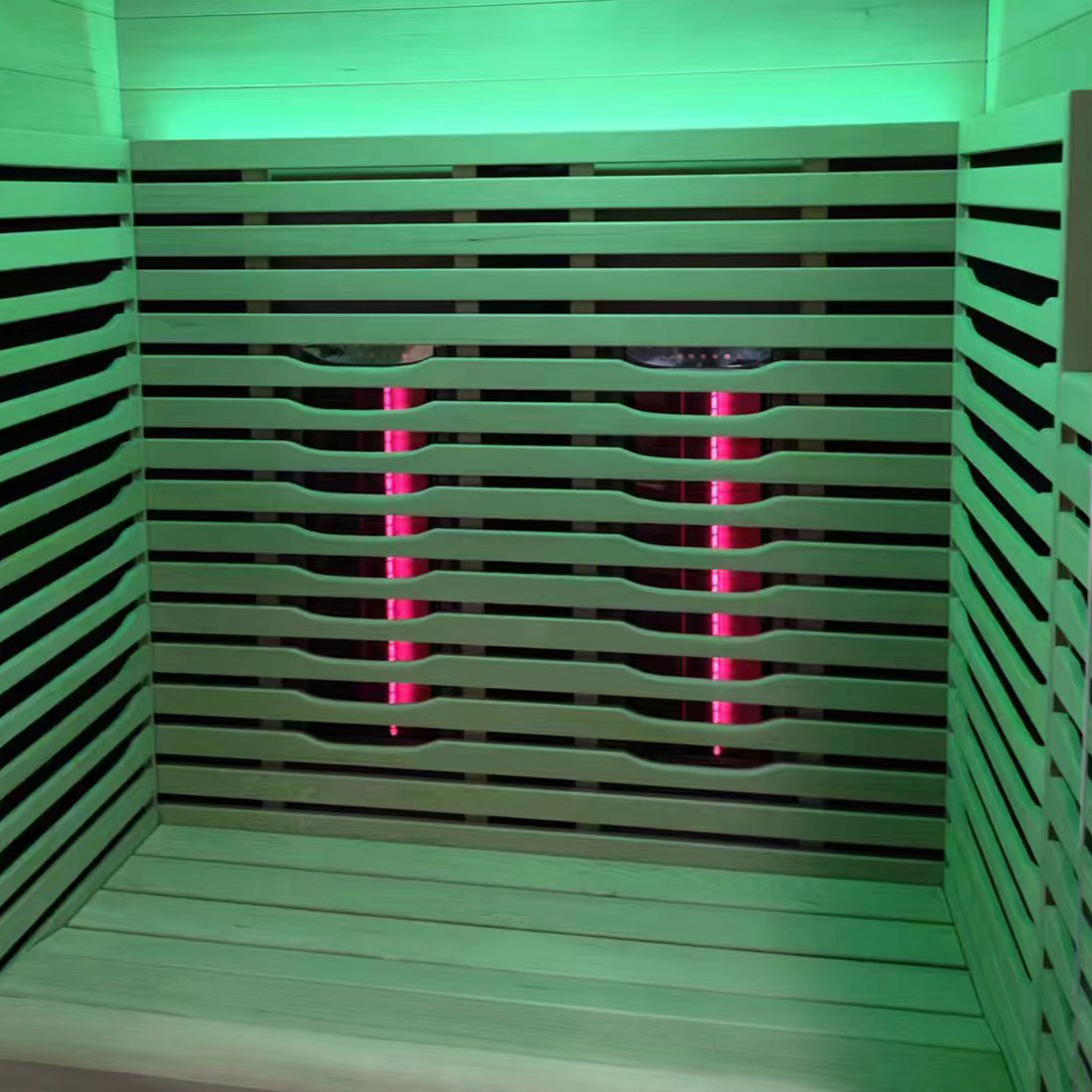 Lue 2 Person Full Spectrum Curved Infrared Indoor Home Sauna with slatted wooden interior, bench seating, glowing infrared tubes, and ambient LED lighting for a relaxing home experience.