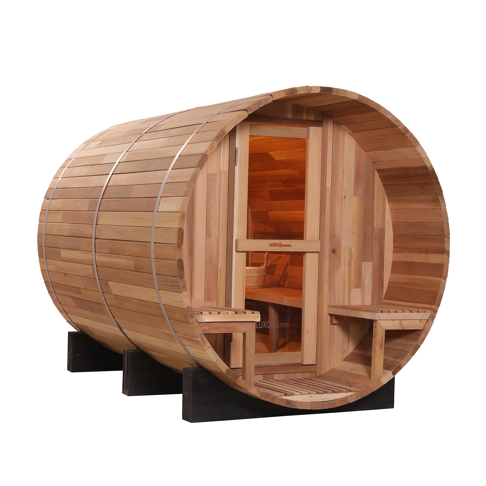 Luola 4-Person Red Cedar Outdoor Barrel Sauna with 8kW Heater, showcasing a wooden barrel structure with a door and bench, highlighting its spacious design and luxurious outdoor appeal.