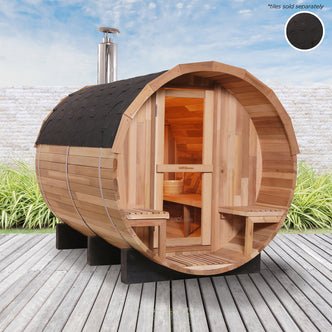 Luola 4-Person Red Cedar Barrel Sauna with Wood Stove, featuring a close-up of its robust red cedar barrel design, chimney, and silver container for a luxurious outdoor relaxation experience.