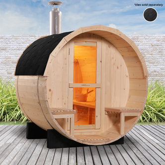 Luola 2 Person Pine Outdoor Barrel Sauna & Wood Stove on a wooden deck, features a cylindrical cabin with a glass-paneled door, benches, and a warm interior glow from the wood-burning stove.