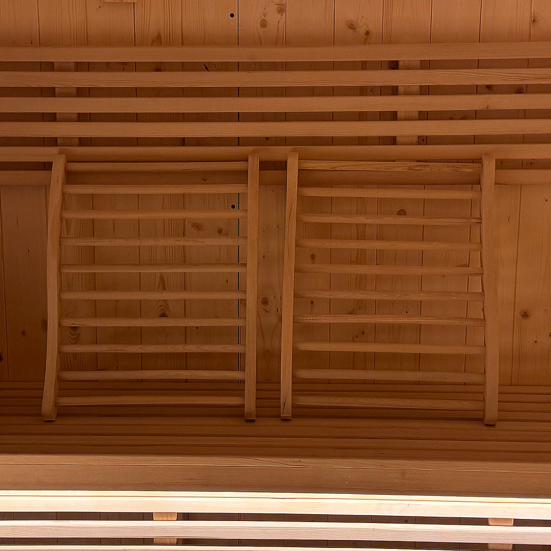 Medika 8 Person Traditional Finnish Outdoor Sauna featuring a close-up of durable wooden slats and a robust wooden ladder, showcasing its sturdy construction designed for outdoor relaxation and heat therapy.