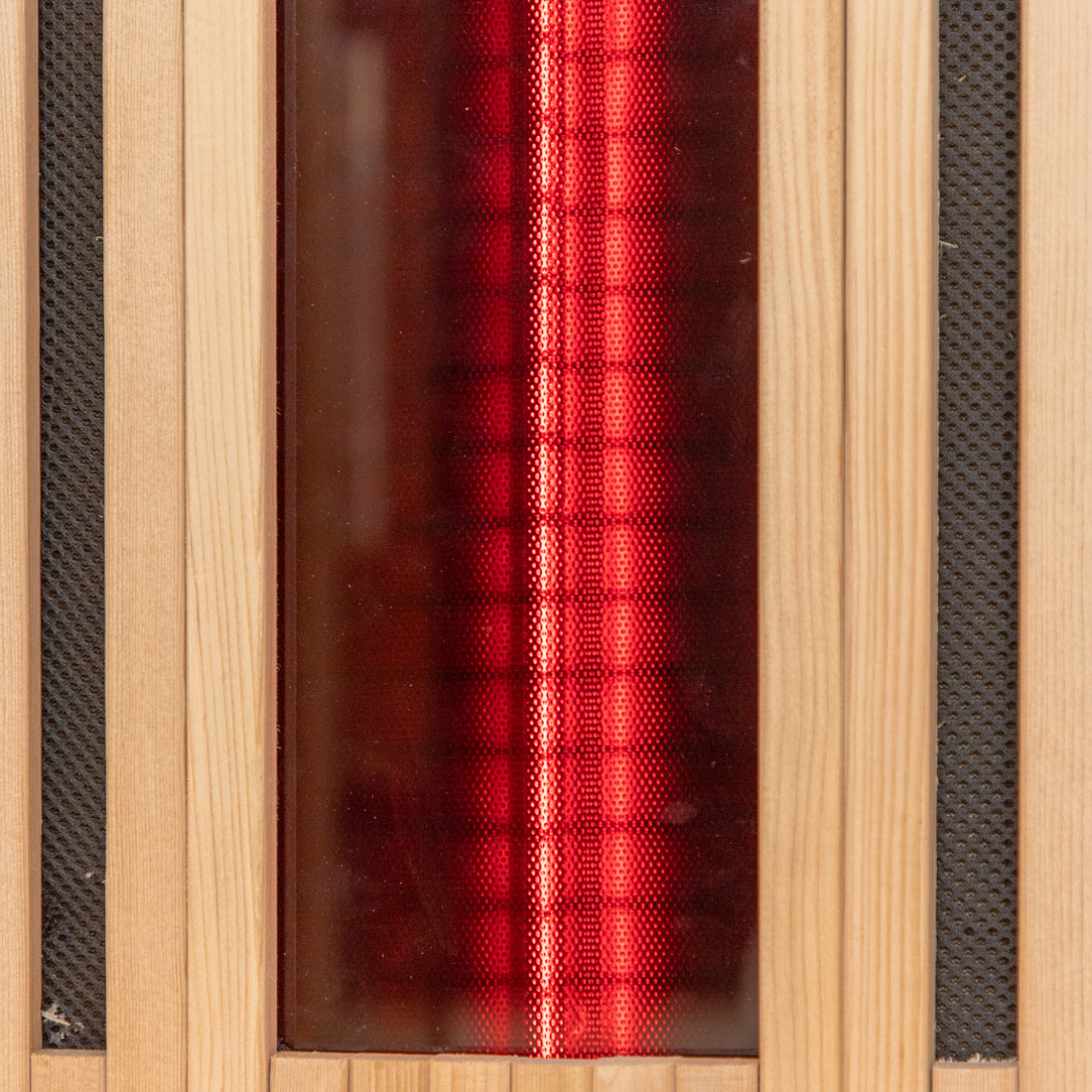 Runko 2 Person Canadian Hemlock Carbon Fibre Infrared Sauna featuring a sleek wood surface, visible red light elements within a wood box and on a glass surface, highlighting modern design and functionality.