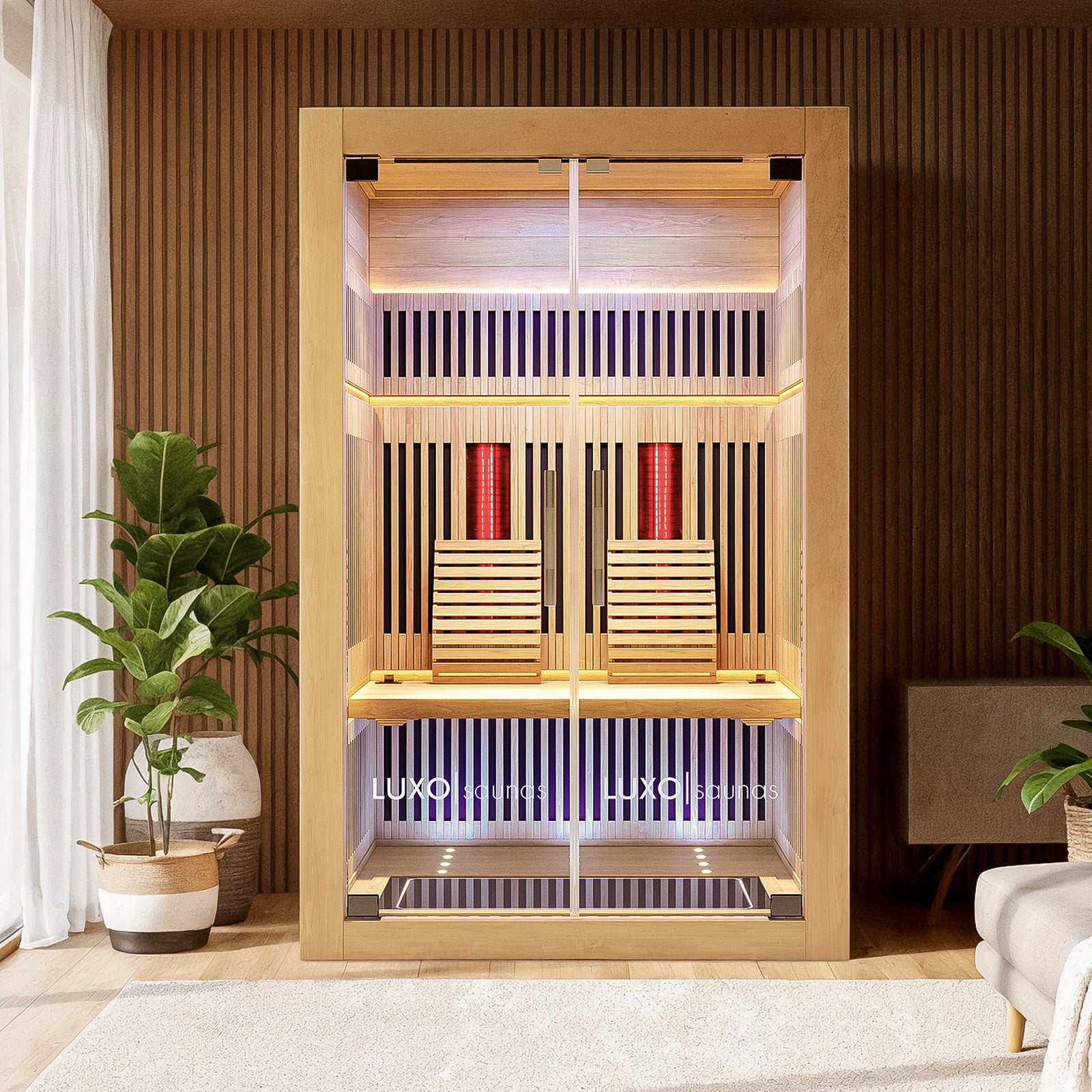 Runko 2 Person Full Spectrum Infrared Sauna with Floor Heaters featuring light wood panels, a glass front door, wooden bench, infrared heating panels, LED lighting, and a digital control panel inside a spa-like room.